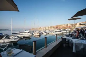Limassol's Lady's Mile beach offers scenic views near the marina, perfect for business travel and wine country exploration